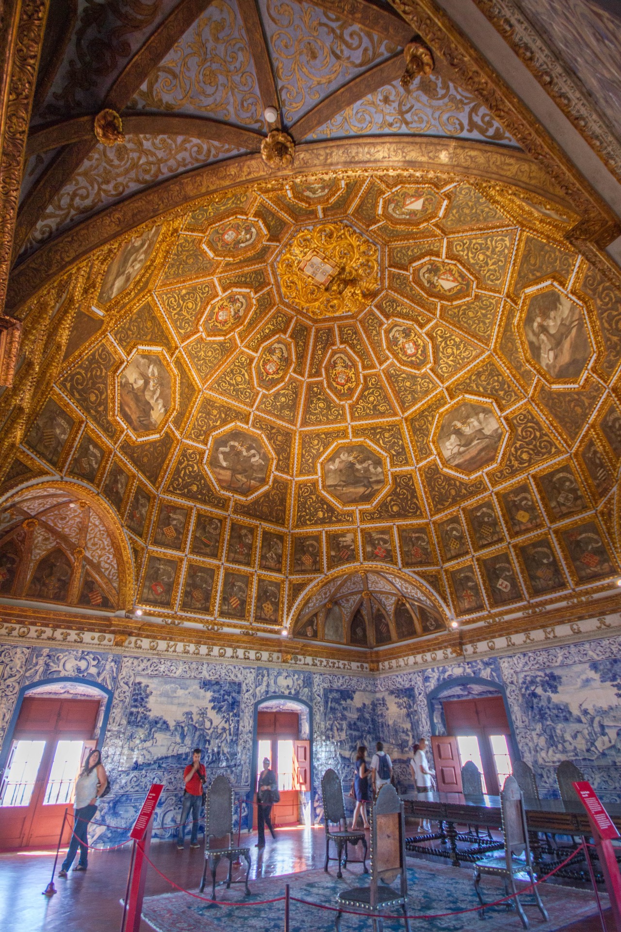 A royal room lined with coats of arms in Sintra, Portugal