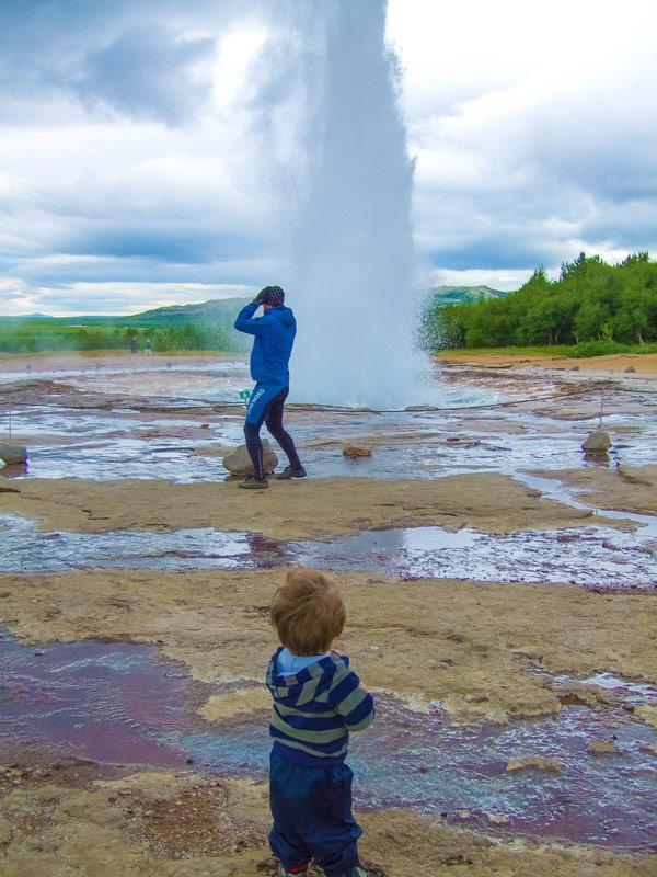 Strokkur Geysir in Iceland erupting on Icelands Golden Circle Tour with kids