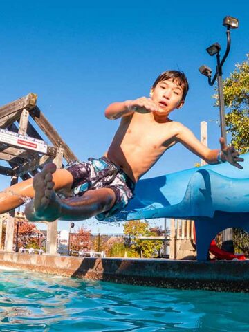How to spend a weekend at Blue Mountain Resort - Boy sliding wildly off of a waterslide