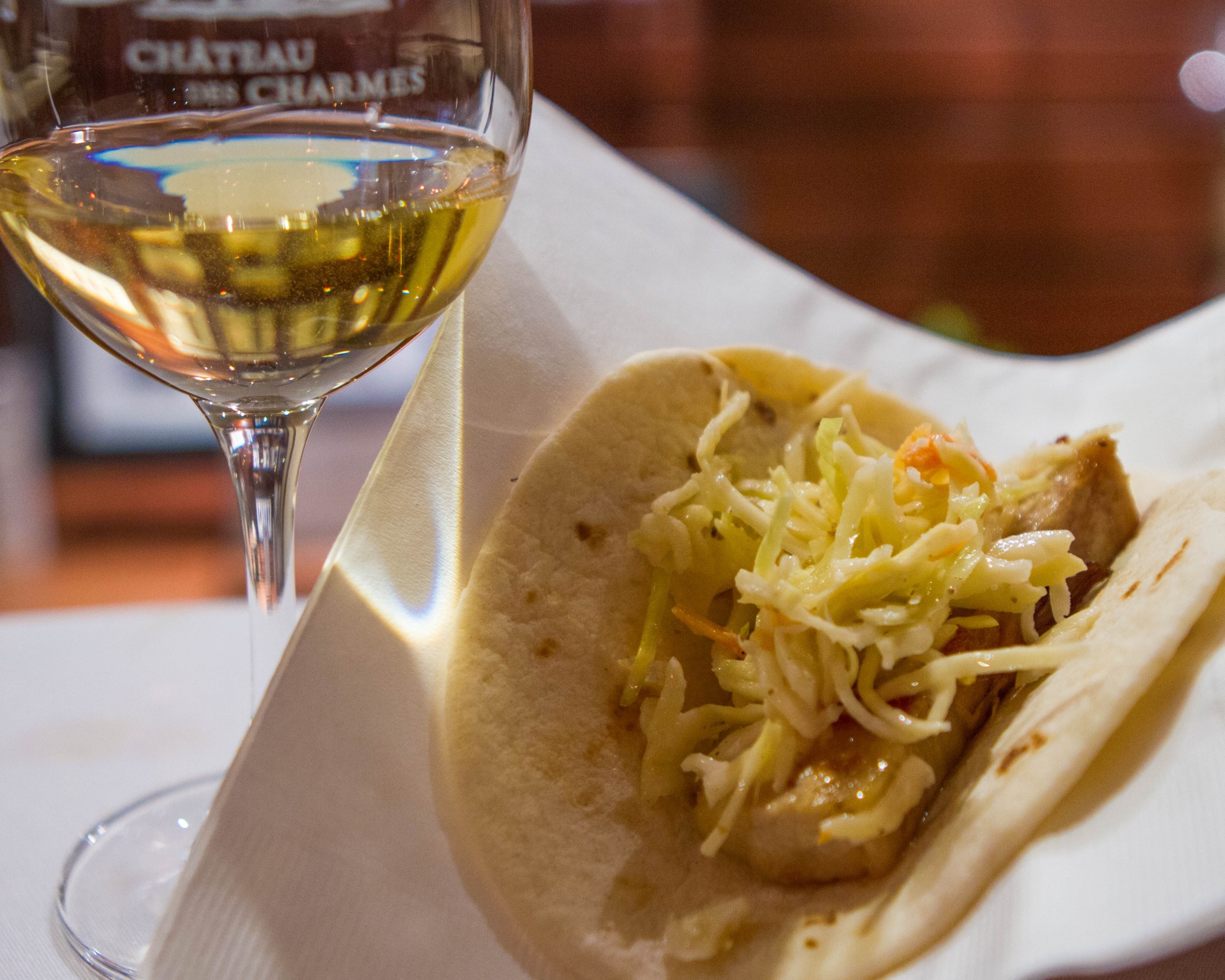 Glass of Chateau des Charmes icewine served with pork belly taco at Chateau des Charmes winery in Niagara-on-the-Lake during the Niagara Icewine Festival