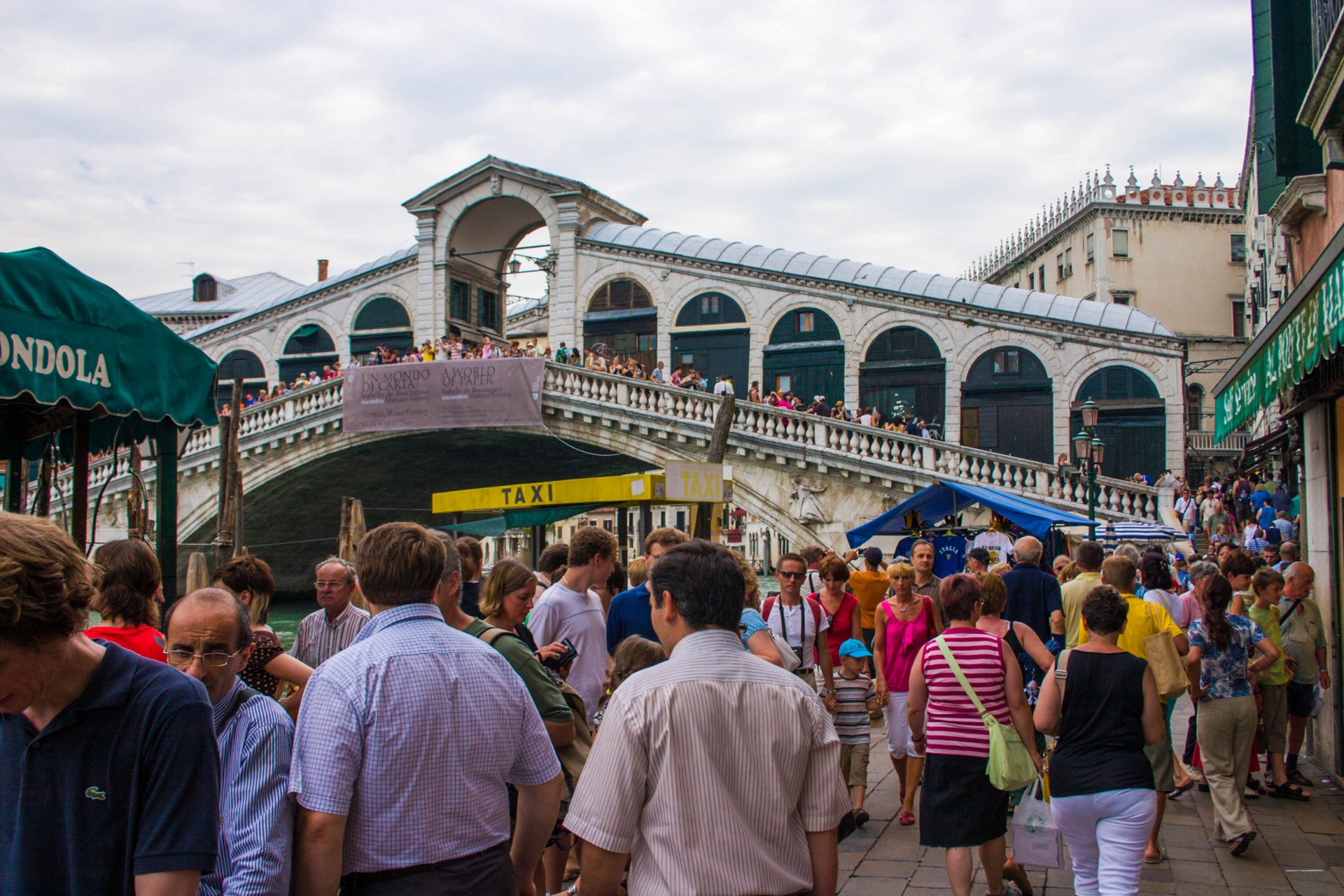 Crowds of tourists fill the bridges and squares of Venice, Italy - Lost in Venice