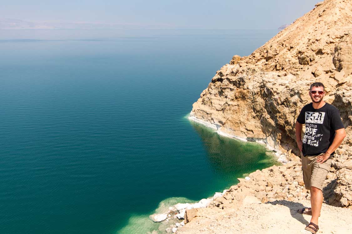 Kevin Wagar smiles at the camera along the shores of the Dead Sea in Jordan