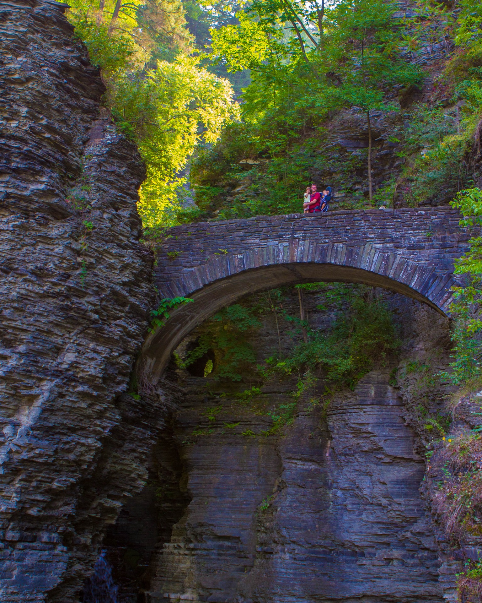 Family stands on the Sentry bridge.