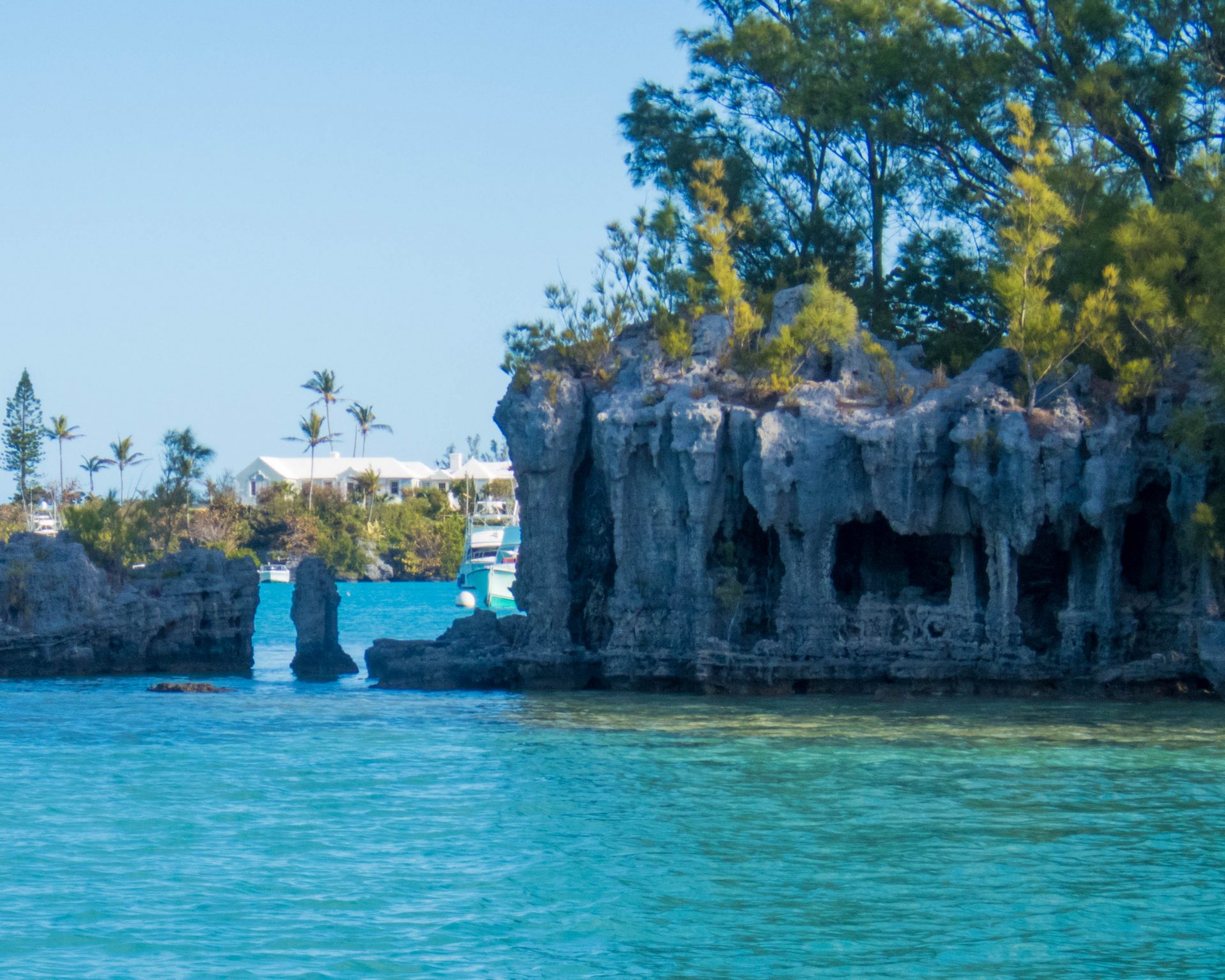 Natural stone columns hold of a roof of rock in a Bermudian harbour - Boating in Bermuda