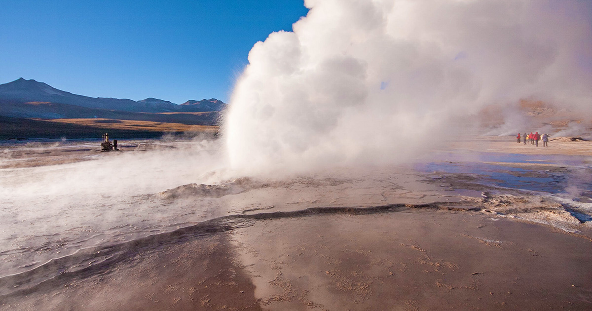 Steam rises from an erupting geyser high in the Andes mountains in Chile