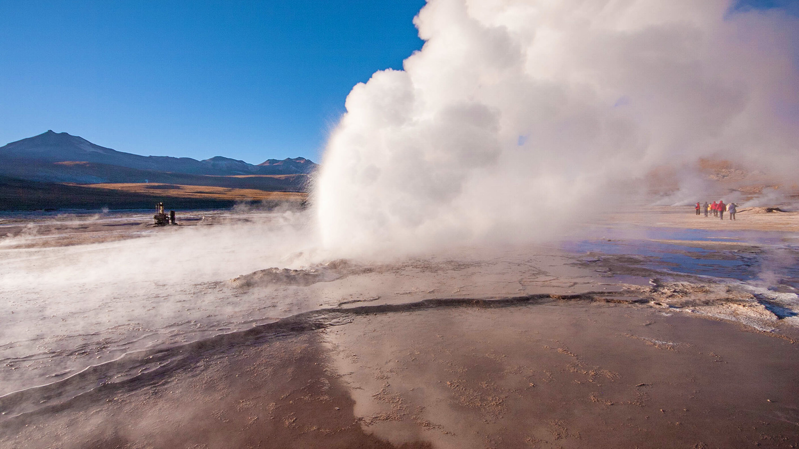 Steam rises from an erupting geyser high in the Andes mountains in Chile