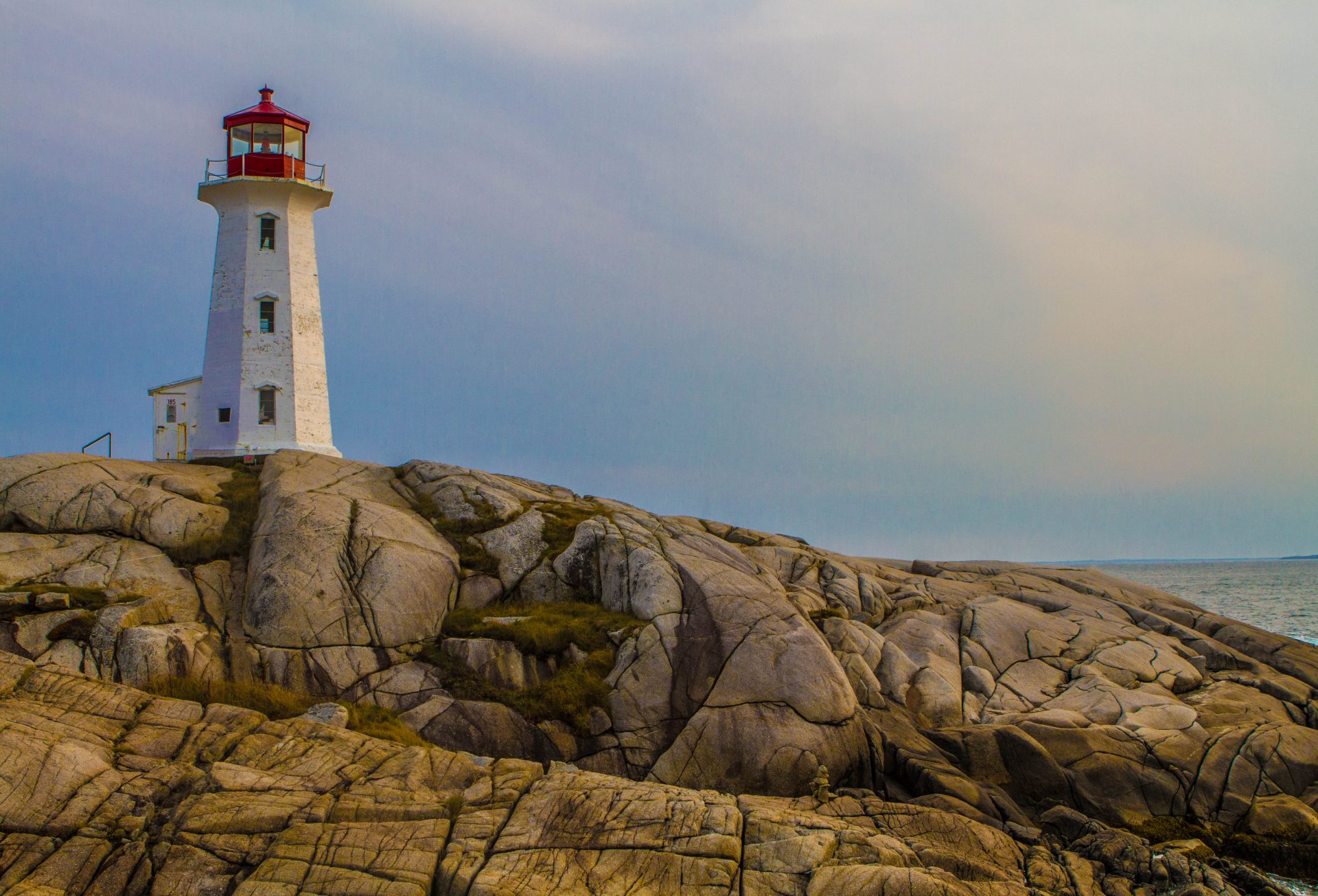 Peggys Point Lighthouse in Peggy's Cove one of our bucket list destinations in Canada.