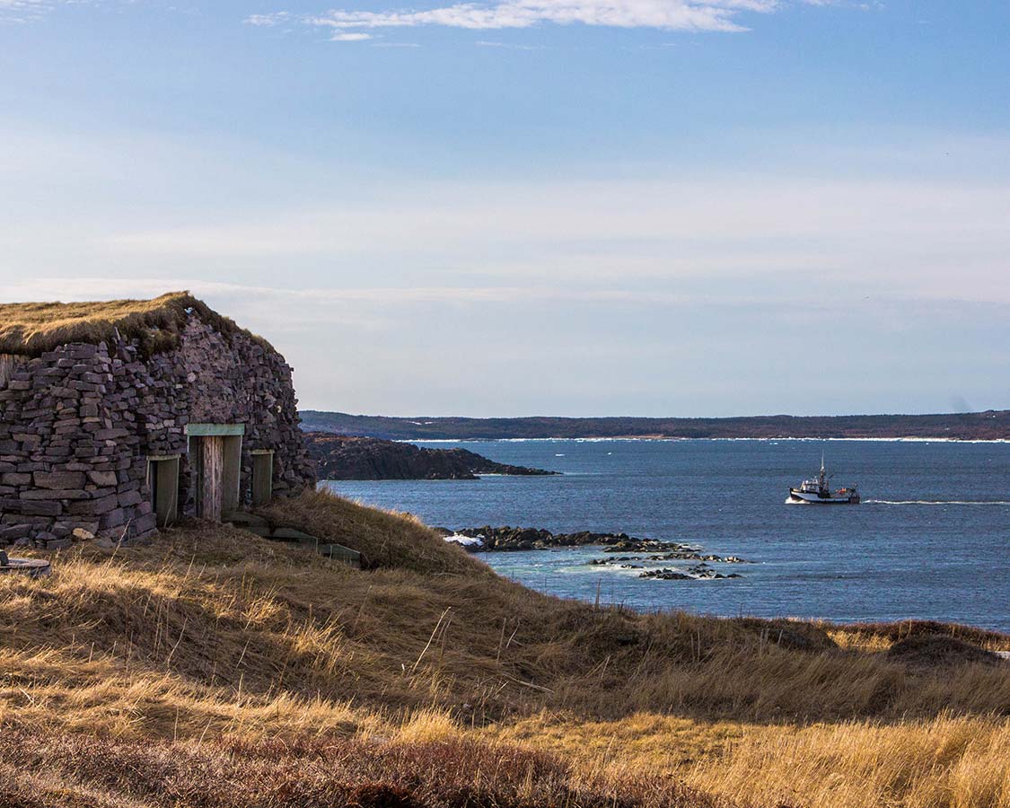 Stone Building and fishing boat in St Anthony Newfoundland