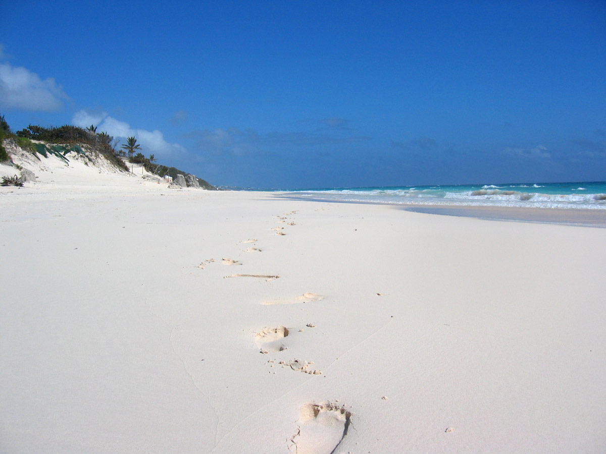 Footprints in the sand at Elbow Bay Beach Bermuda, one of the best Bermuda Beaches