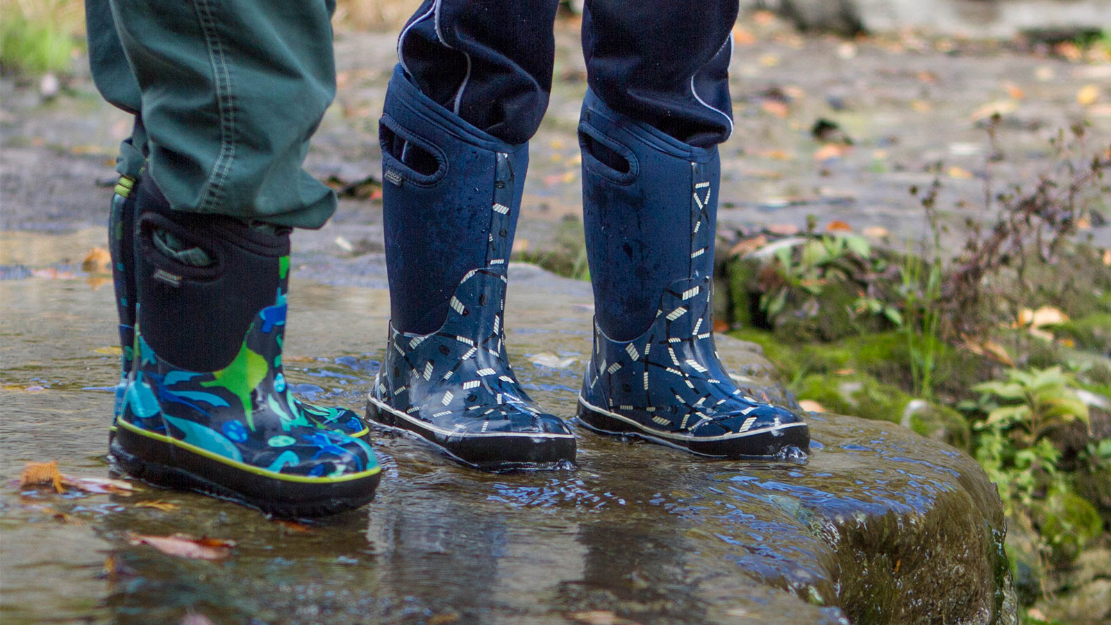 Closeup of children wearing bogs snow boots - Bogs kids winter snow boots