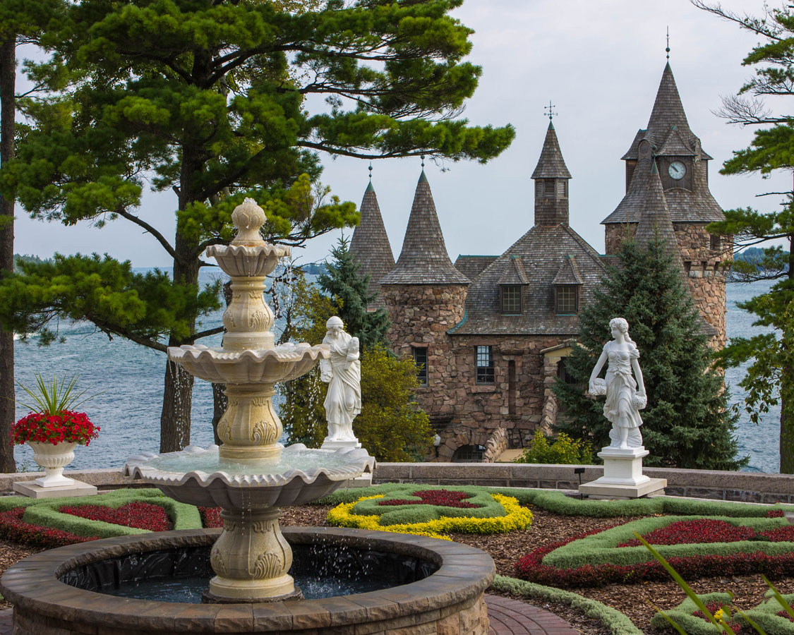 The Power House in the background and gardens in the foreground of Boldt Castle.