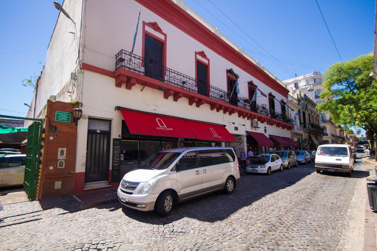 Van parked in cobblestone street in San Telmo.