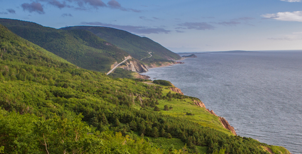 The Cabot Trail winds along the coast of Nova Scotia and is one of our 12 unforgettable Canadian road trips.