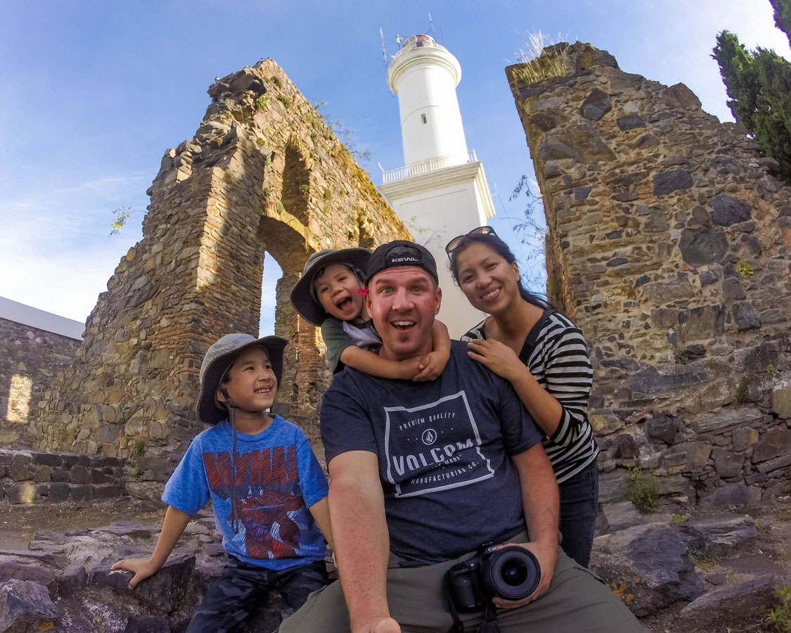 Family poses inside the San Francisco convent ruins in Colonia del Sacramento, Uruguay.