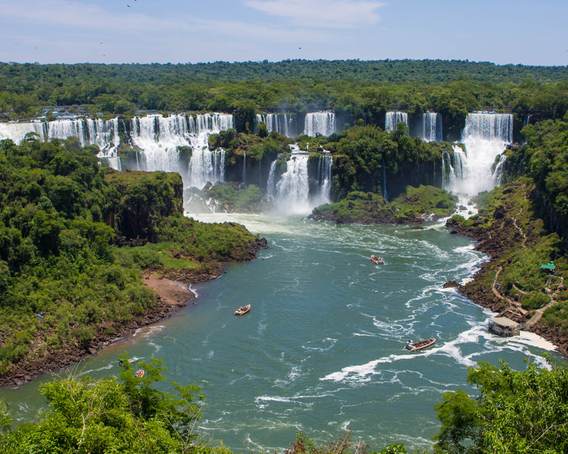 Boat tours heading to the some of the waterfalls in Iguazu falls.