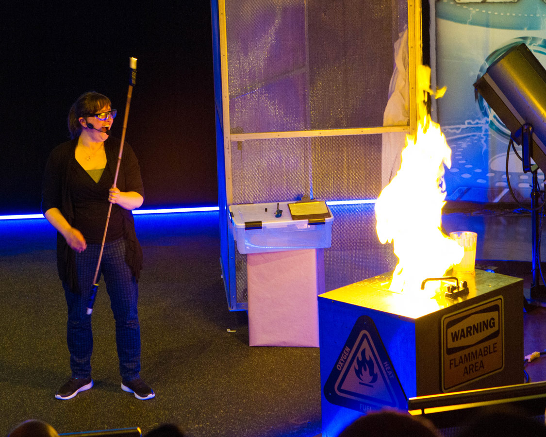 A scientist makes a sink explode in flame at the Ontario Science Centre Energy Show