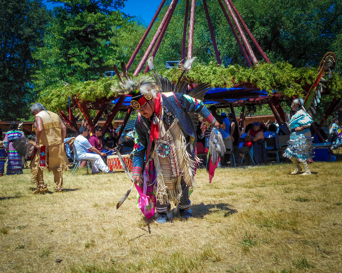 A Native elder dances at a First Nations Pow Wow