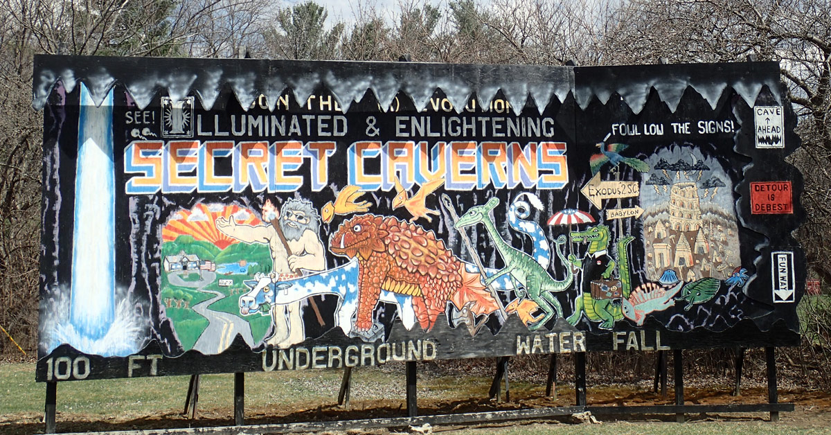 One of the famous hand drawn billboards you drive by on your way to Secret Caverns New York.