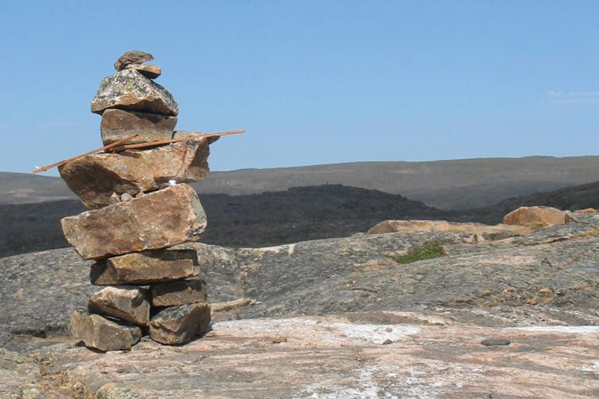 An inukshuk near Iqaluit Nunavut, one of the most amazing places in Canada