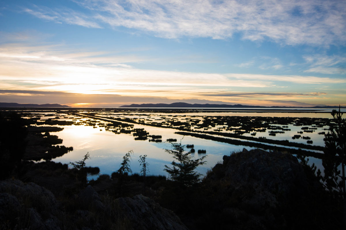 Sunrise over Lake Titicaca in Peru. A wonderful sight to see while visiting Lake Titicaca with Kids