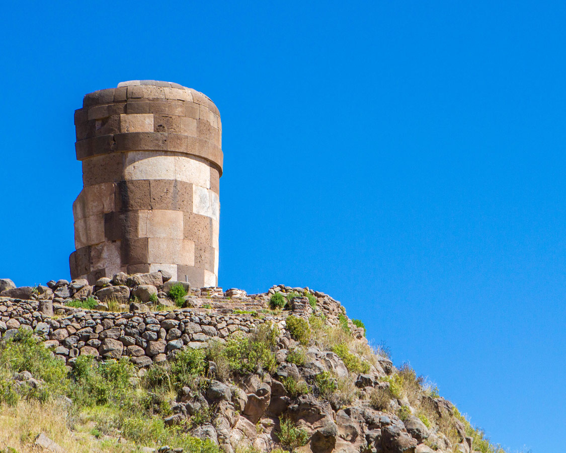 Chullpas or pre-incan burial towers in Sillustani Peru on our way to see the Andean Condors in Colca Canyon with Kids