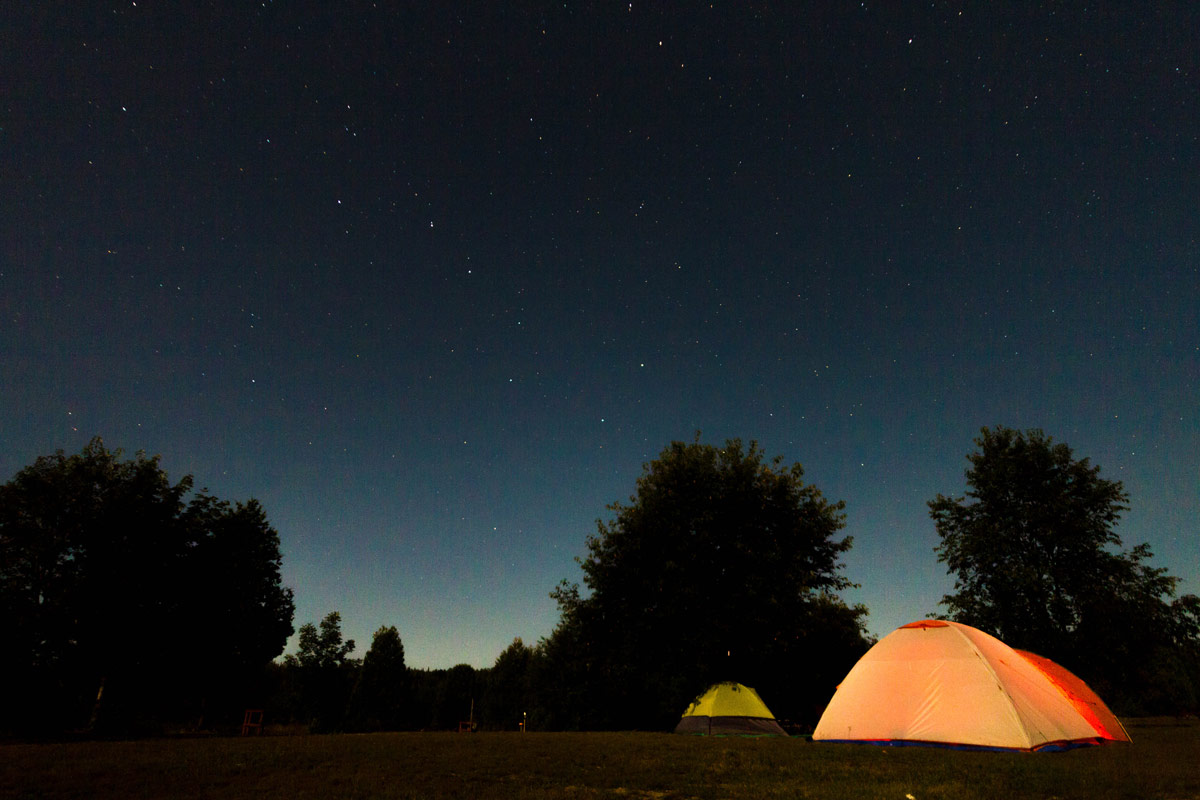 Camping tents at Gordons Park Dark Sky Preserve on Manitoulin Island. A visit to Gordons Park is one of the best things to do on Manitoulin Island