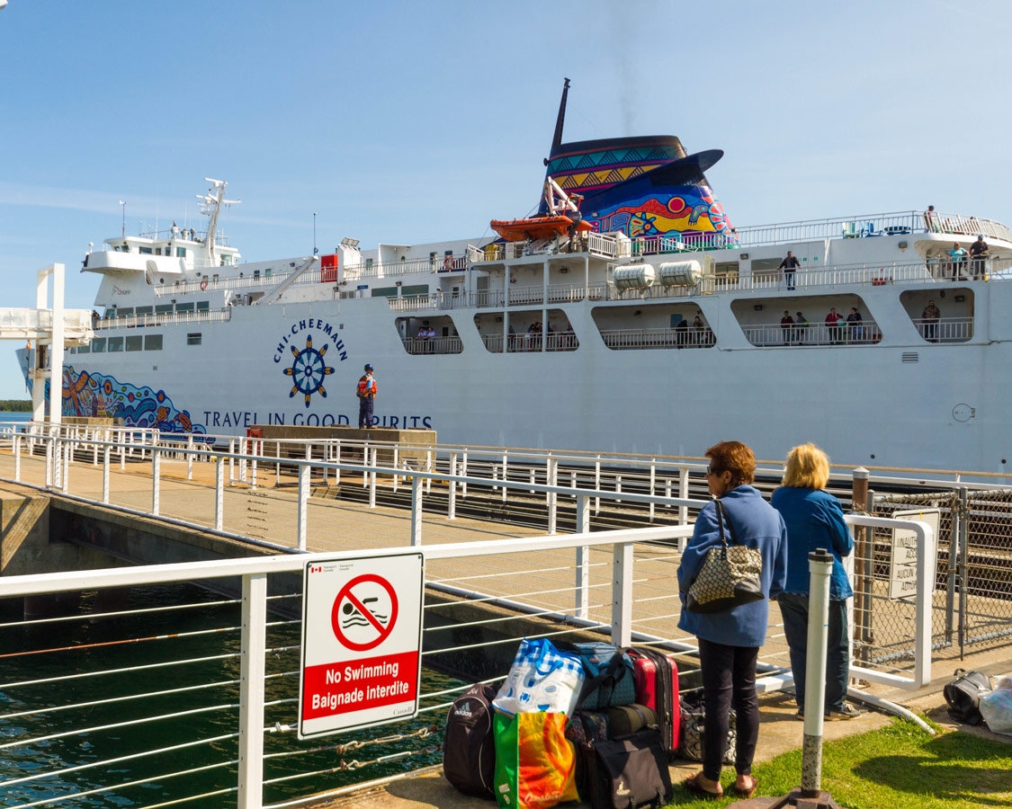 Travelers wait to board the Chi Cheemaun Ferry in South Baymouth Manitoulin Island. A trip on the Chi Cheemaun Ferry is one of the best things to do on Manitoulin Island