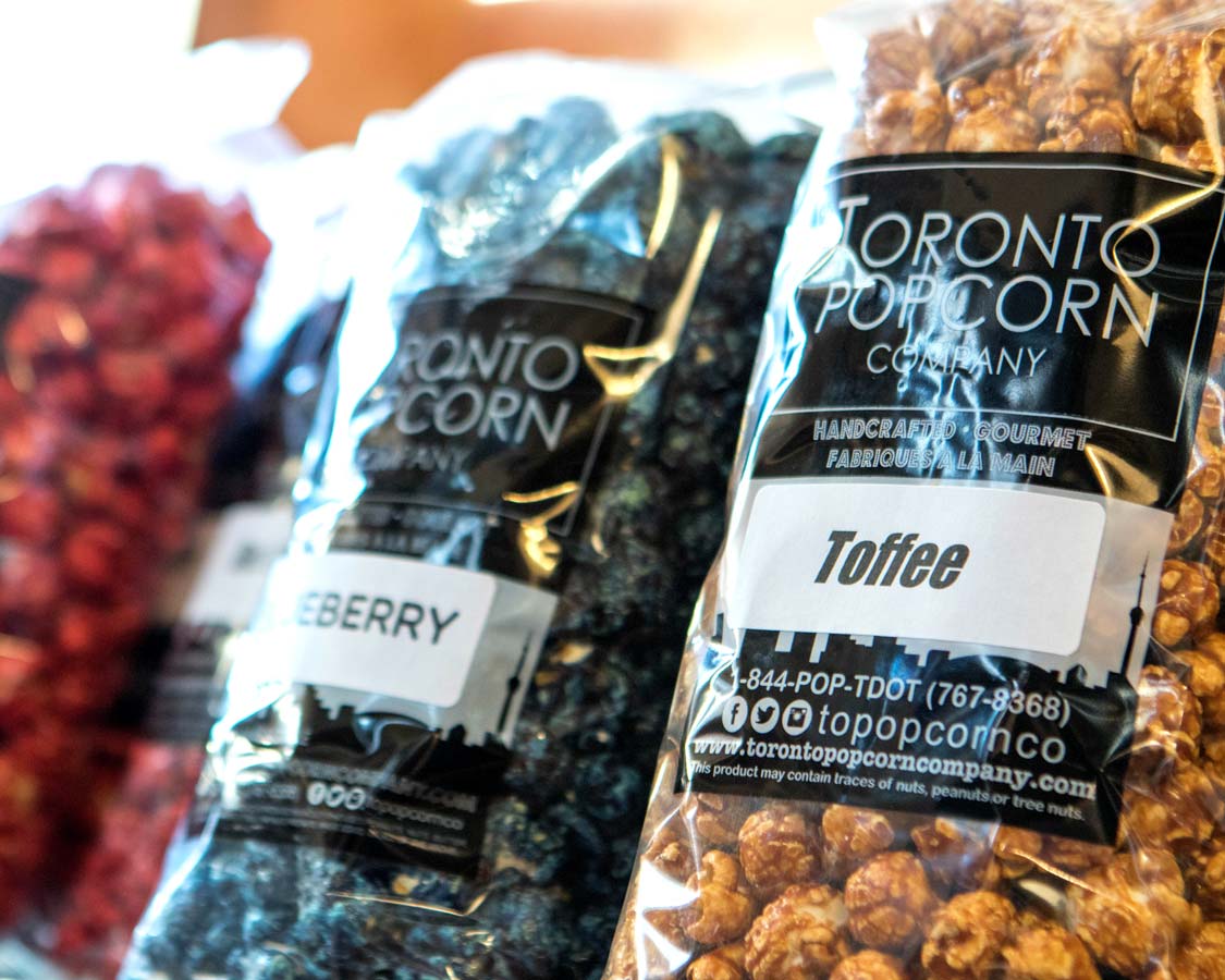 Bags of flavoured popcorn from the Toronto Popcorn Company in Kensington Market on a Toronto Food Tour with Tasty Tours Toronto