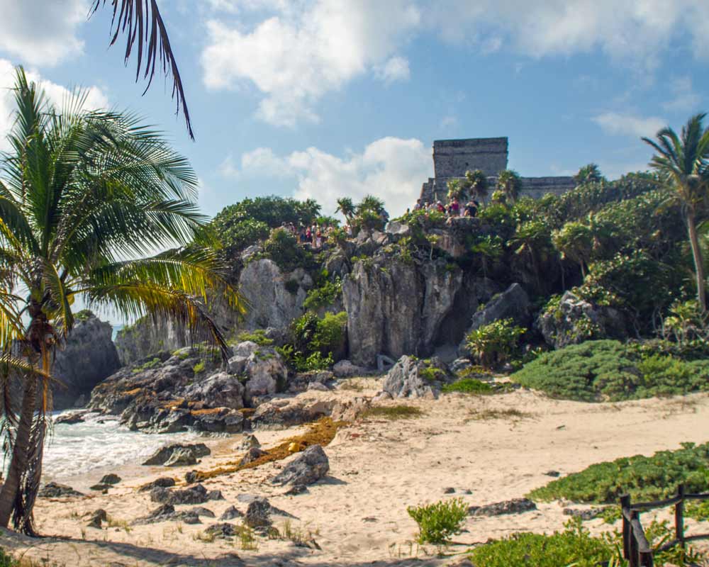 Tulum ruins viewed from the beach in Tulum Mexico with kids