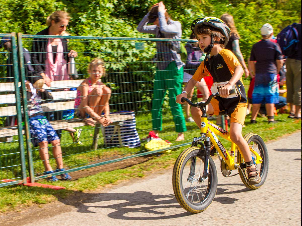 Boy rides bike during Shufelt Kids Triathlon in Peterborough Ontario