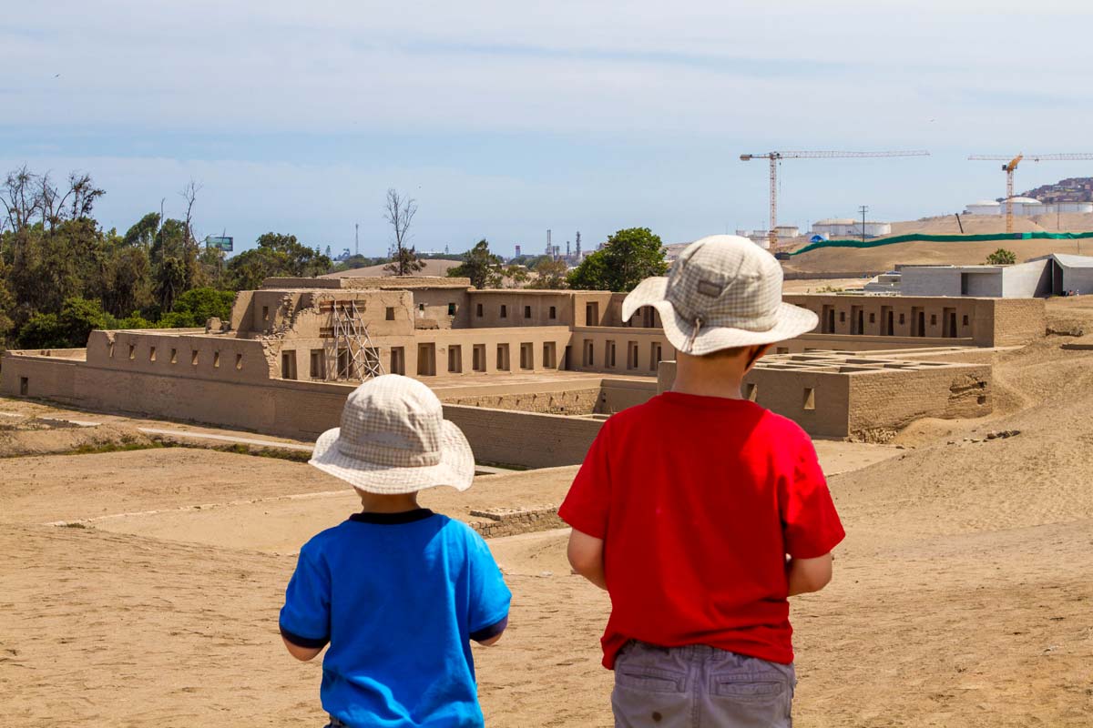 Boys in front of Acclawasi in Pachacamac Peru with kids