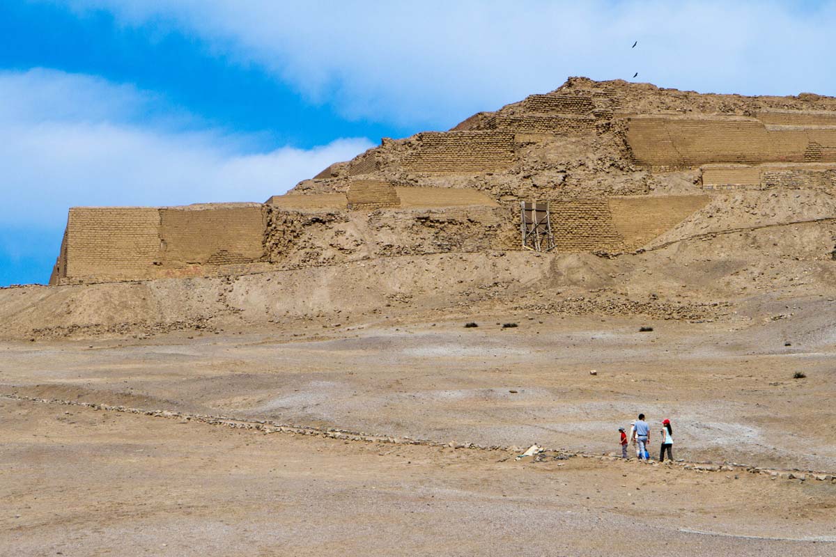 Christina and the boys walking towards the Temple of the Sun in Pachacamac Peru for family travel