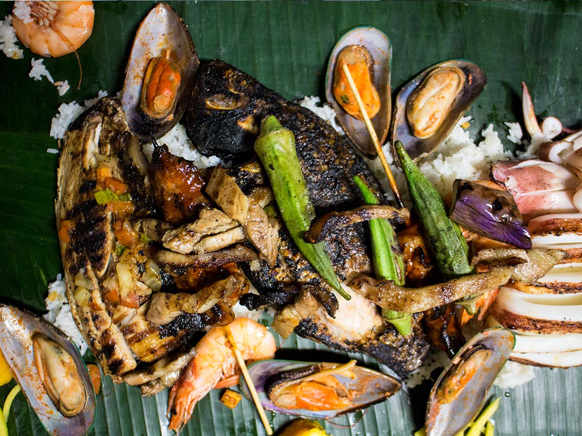 Filipino hand to mouth meal at Tunino restaurant in Toronto Ontario