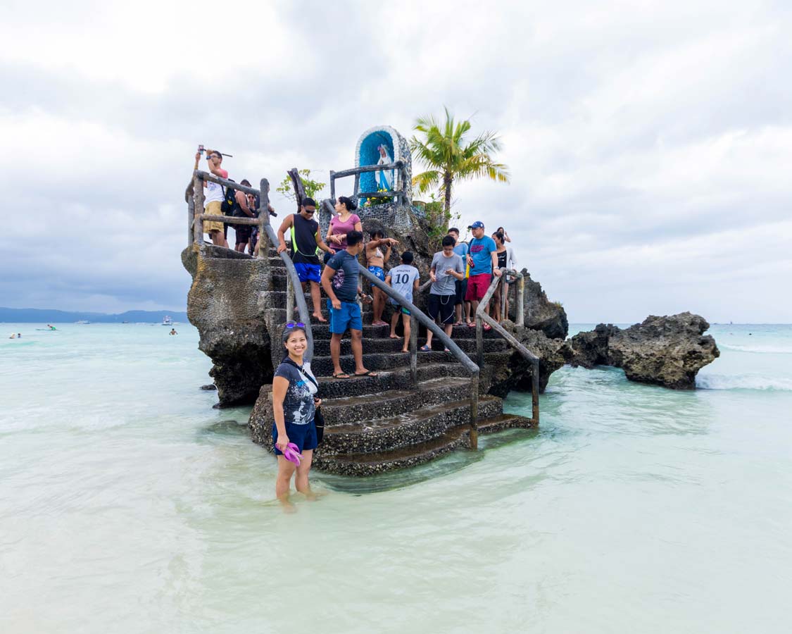 Willy's Rock in Boracay Philippines with typical crowds