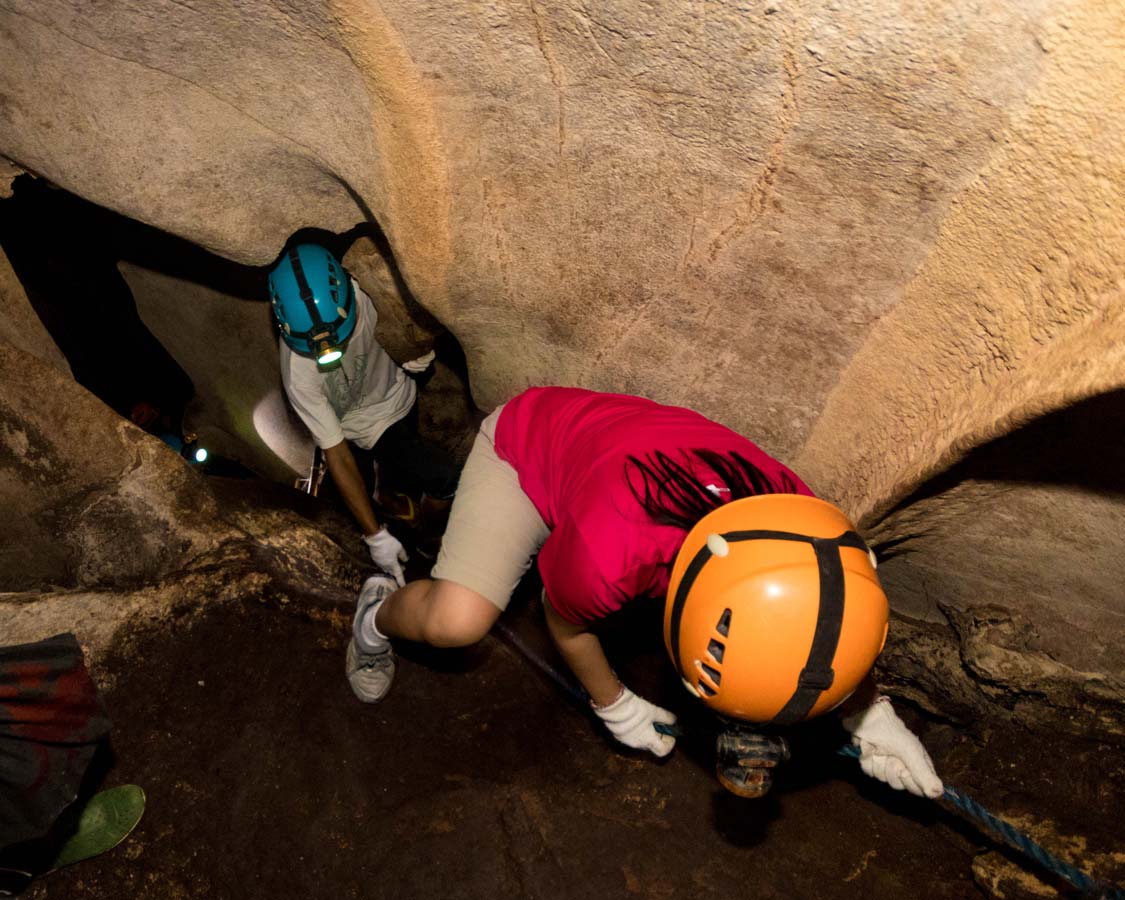 Christina Wagar climbs down Hundred Caves in Palawan