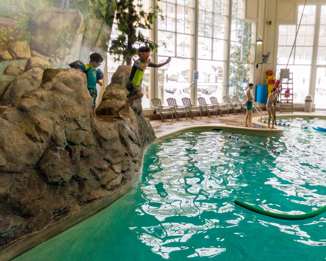 Wandering Wagars boys jumping from cliffs at the Mont Tremblant Aqua club pool