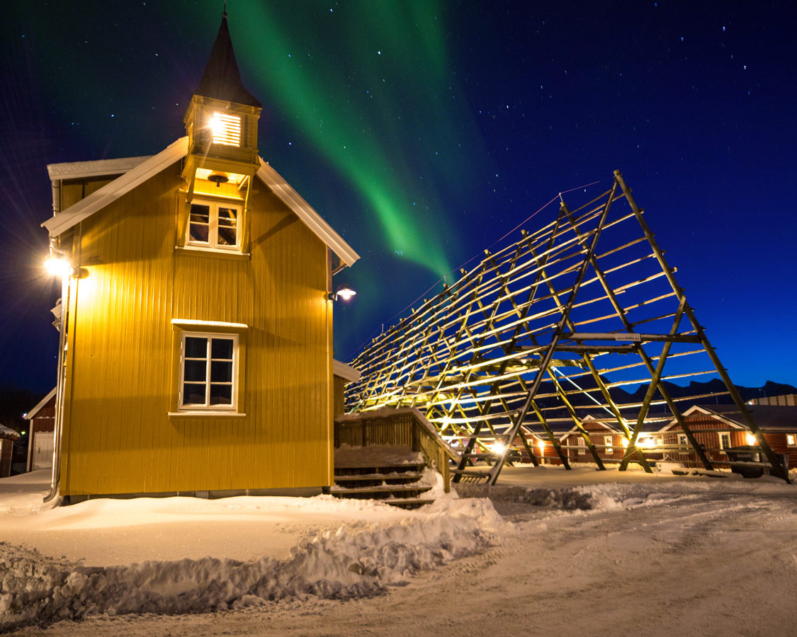 Northern Lights with Chuch and Fish Racks in Svolvaer Norway Coastal Cruise