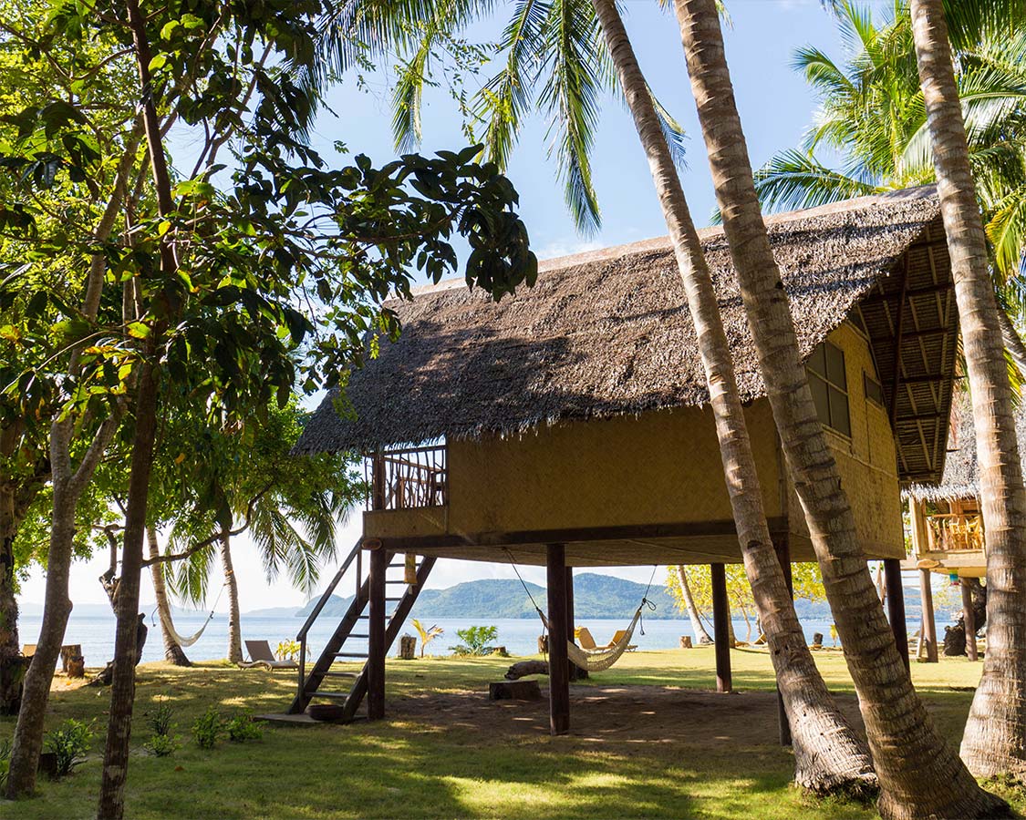 Wicker chalets at Sangat Island Resort