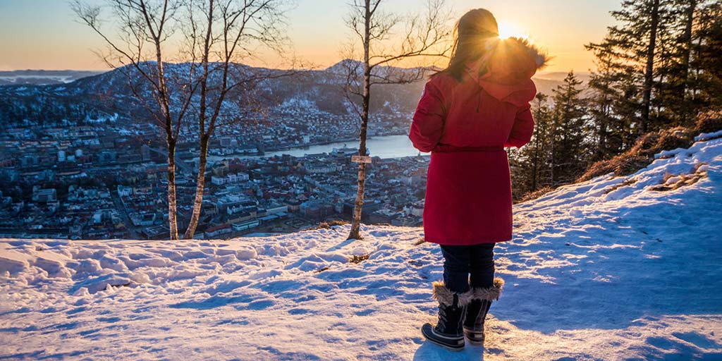 Want to know what to pack for Norway in winter? For exploring the cities, trails, and fjords we have the ultimate Norway winter packing list for the family