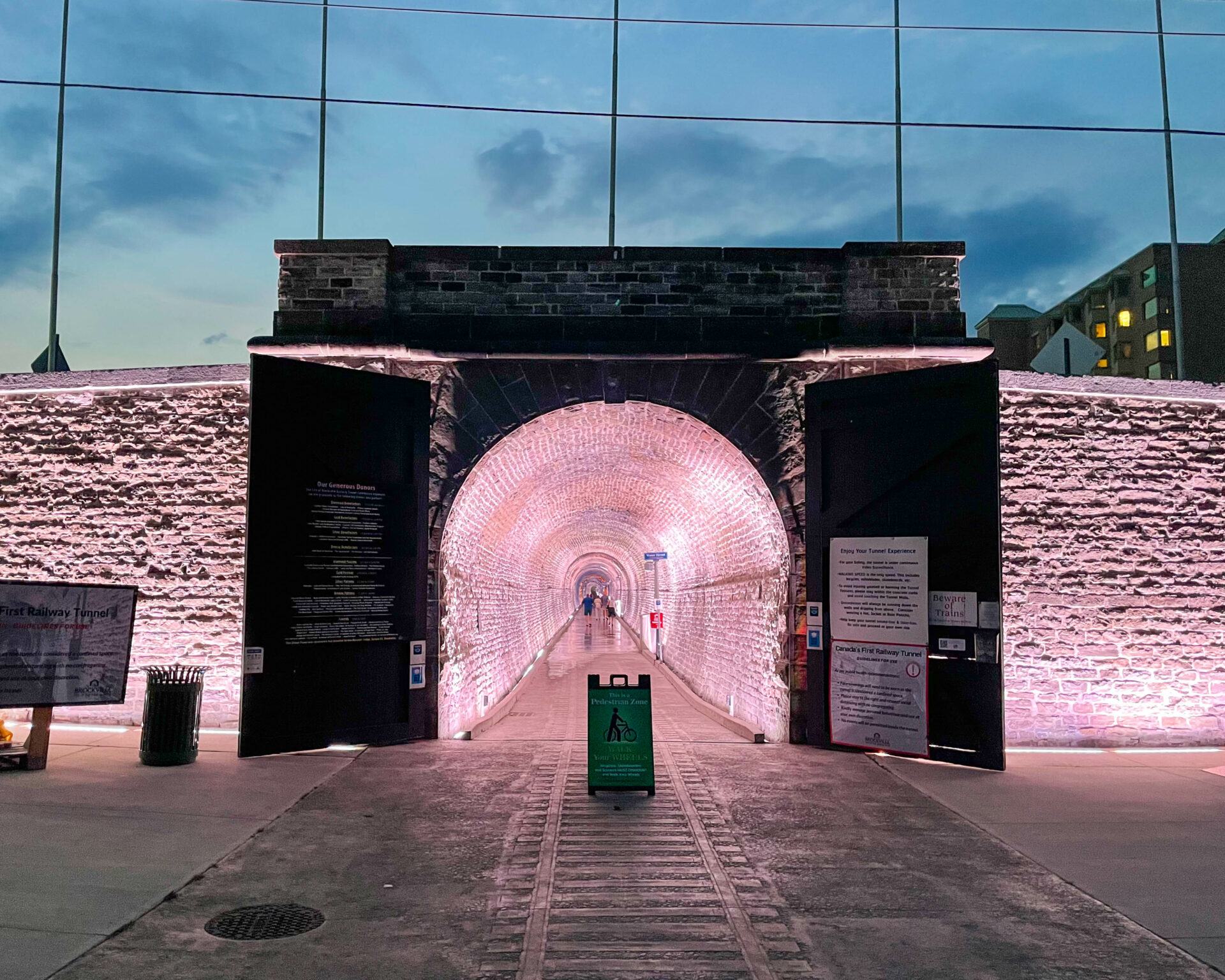 Brightly lit entrance to an historic rail tunnel in Brockville Ontario