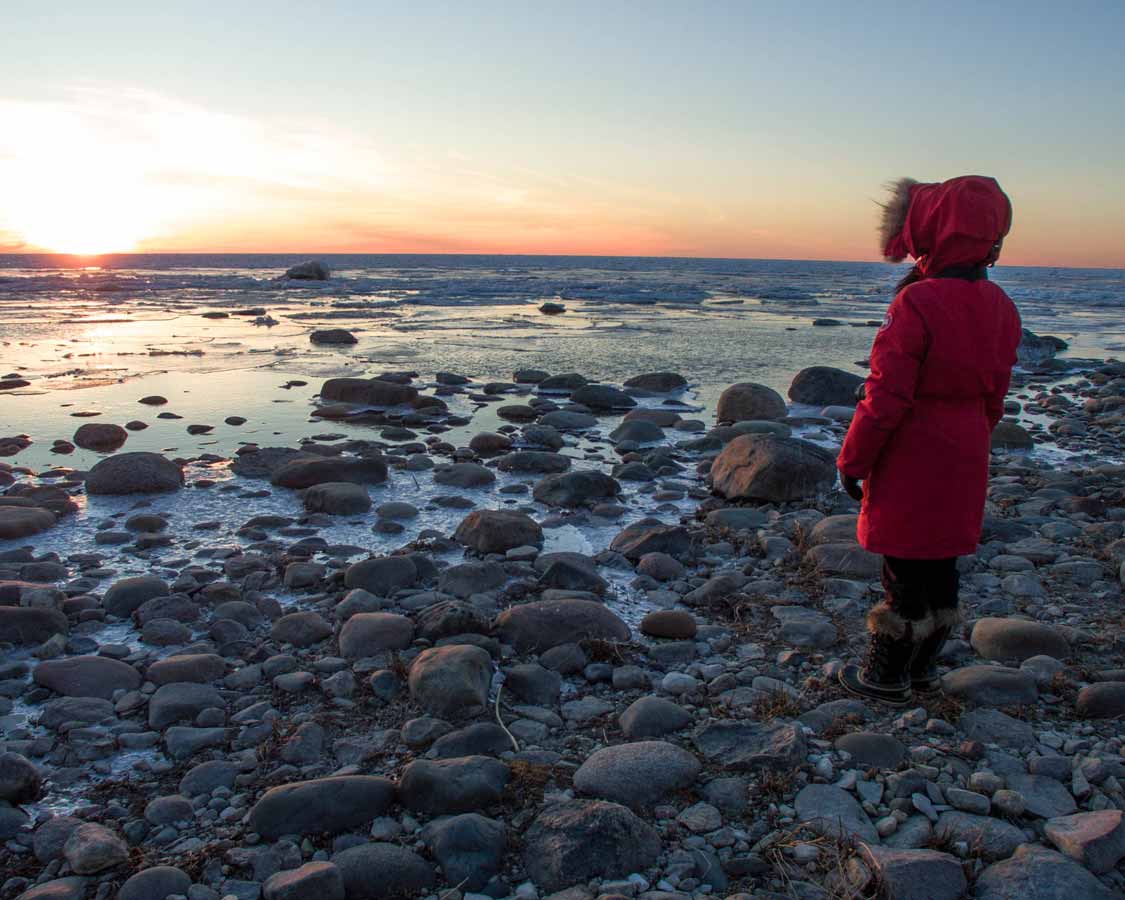 Woman watching sunset at MacGregor Point Ontario