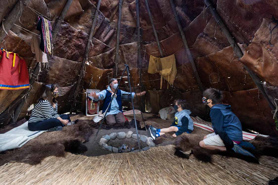 Storytelling inside a wigwam at Fort Williams Historic Park