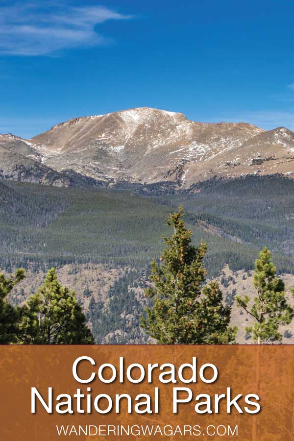 Mountains in front of forests talking about National Parks in Colorado