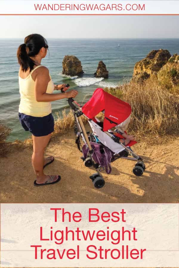 Woman pushing a stroller by the edge of the ocean