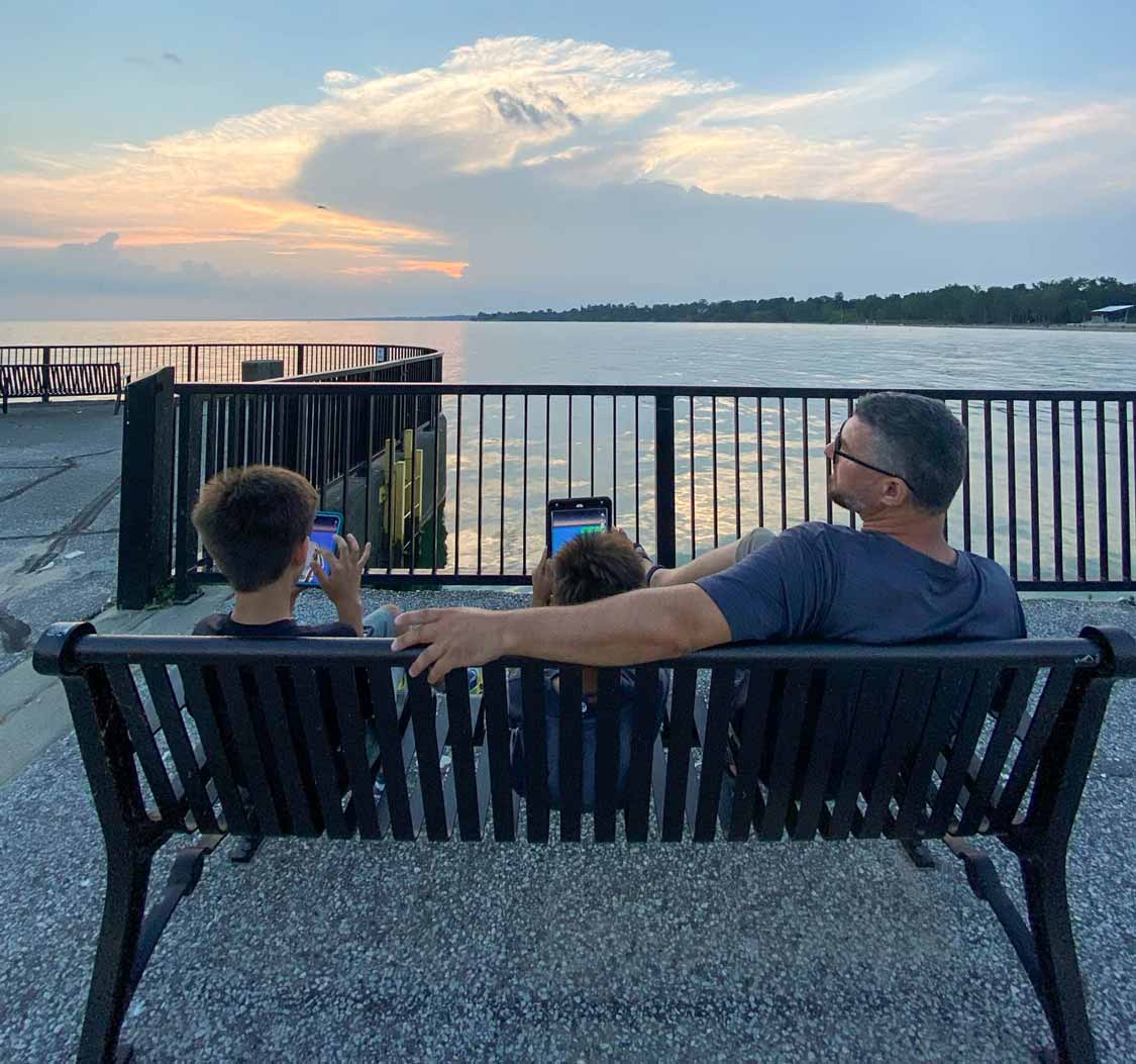 Family playing Pokemon Go in Leamington, Ontario