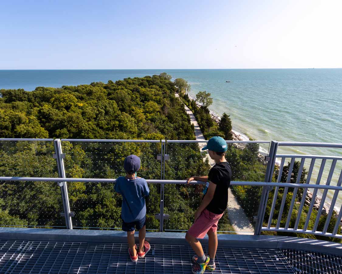 Boys looking out at Point Pelee from the observation tower