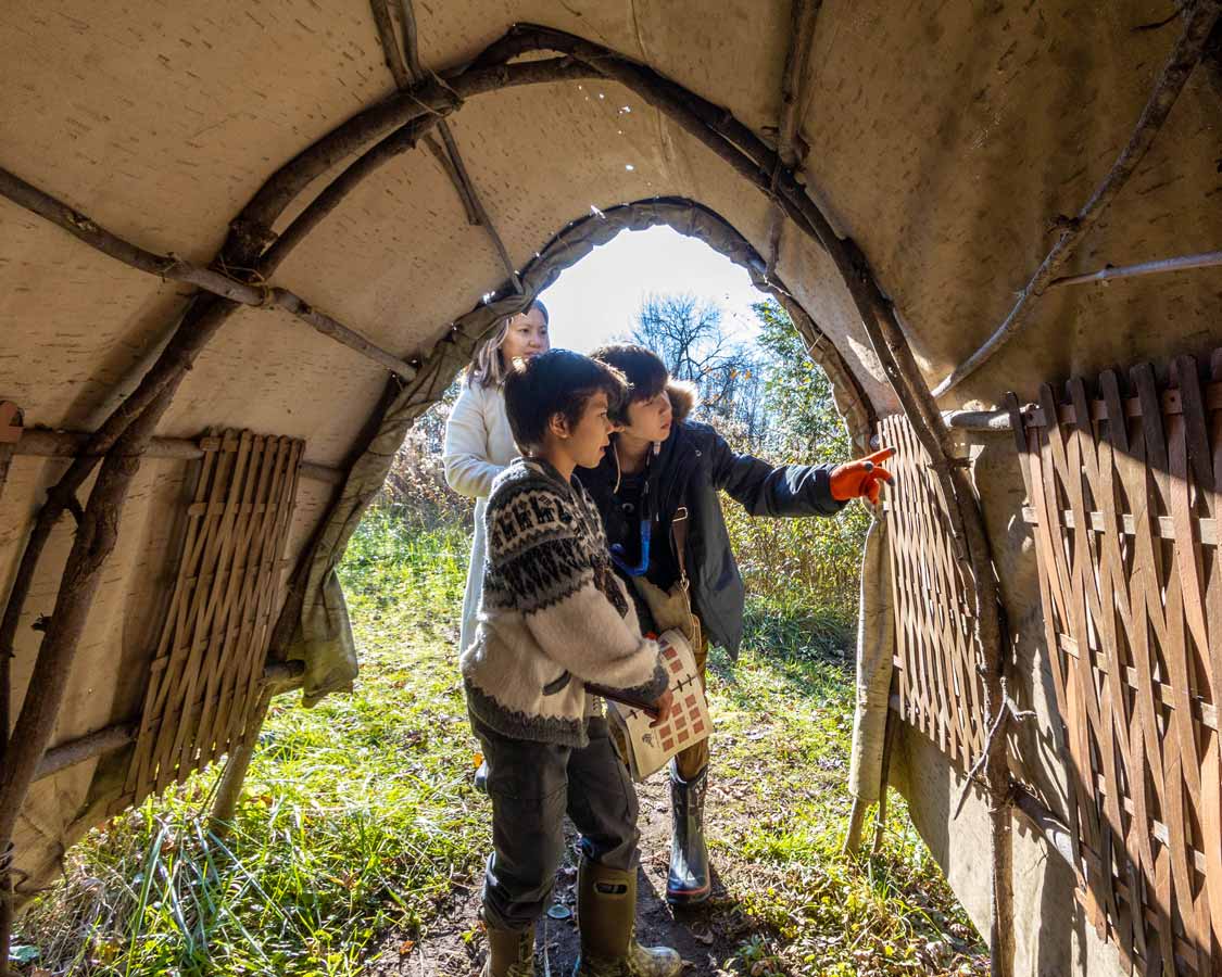 A family tries to solve a puzzle at Escape Maze Peterborough