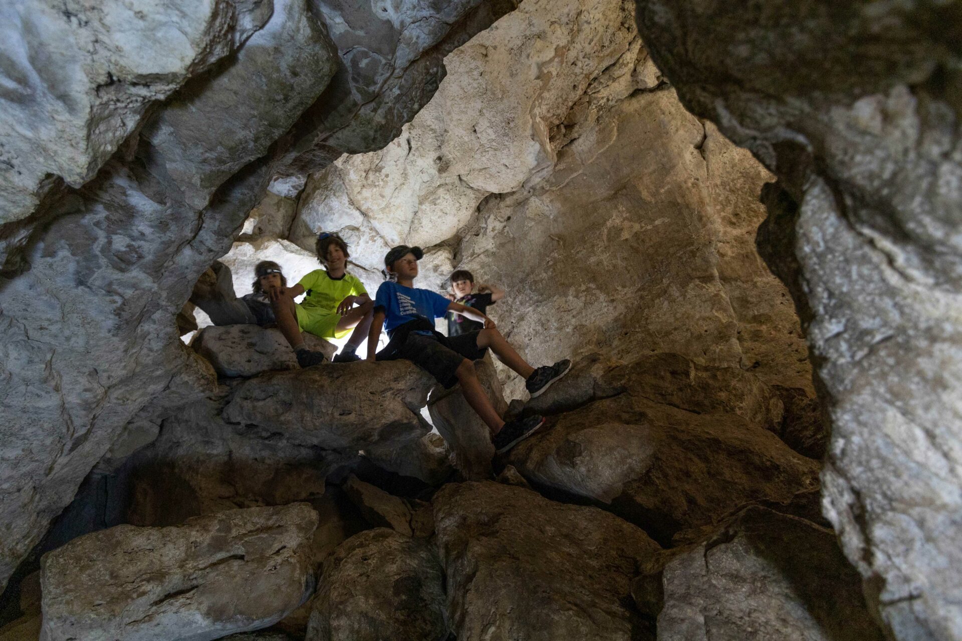 A family explores Greig's Caves in Bruce Peninsula, Ontario