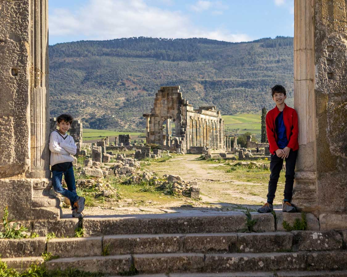 Children at the Volubilis Roman ruins in Meknes, Morocco