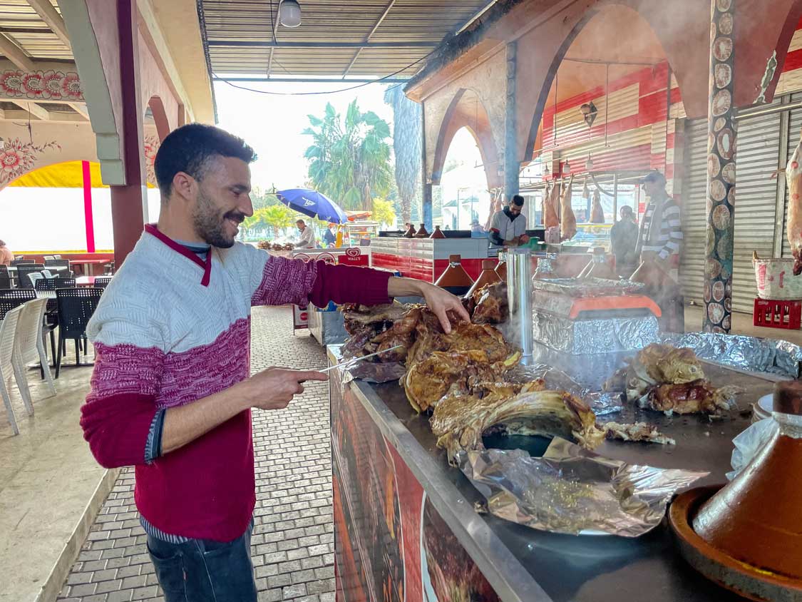 Eating lamb near Meknes Morocco itinerary